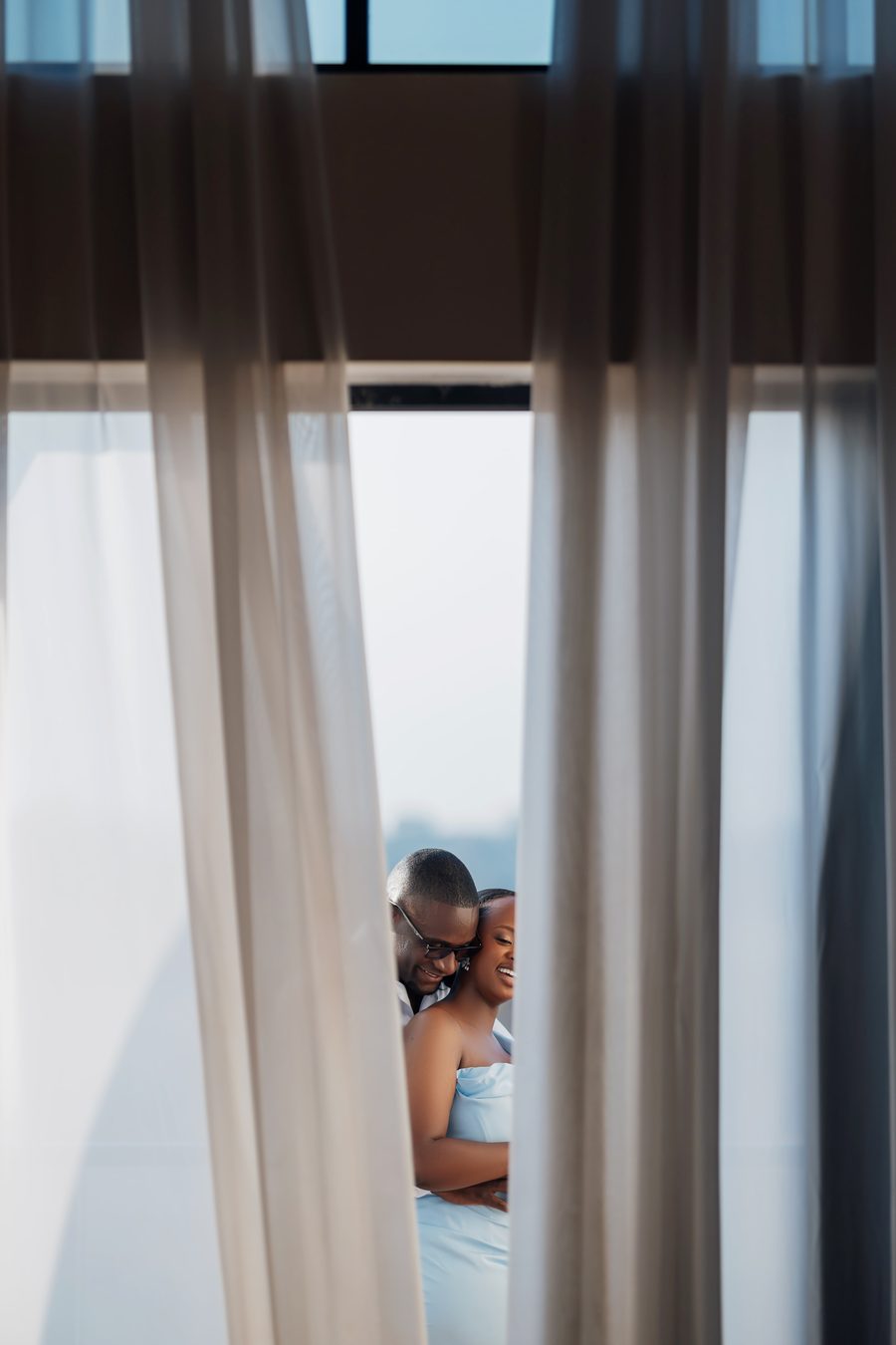 Silhouette by the curtain